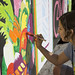 Painting a Metro bus mural